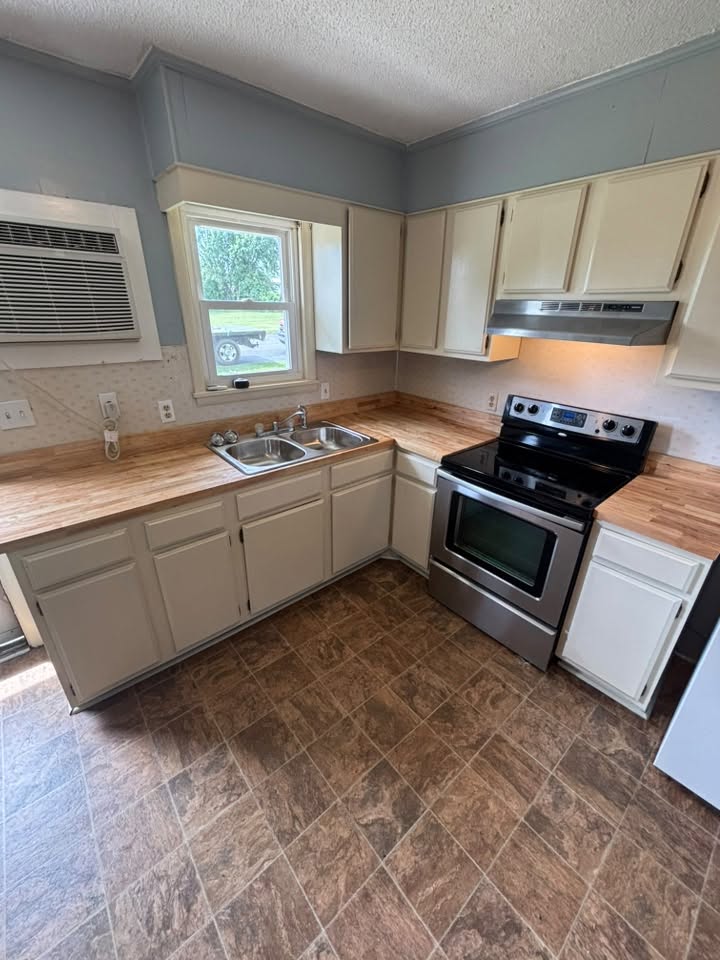 Kitchen sink, cabinetry, and countertop work by K&S Contracting LLC